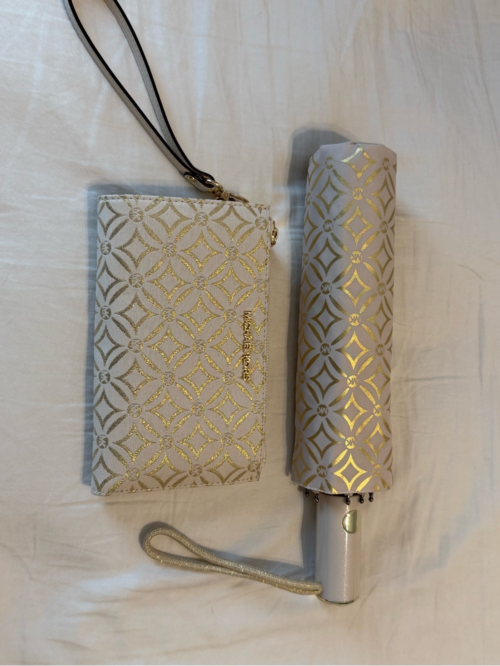 Michael Kors wallet and umbrella